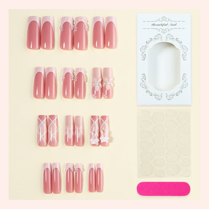 Kunstnagelset mit eleganten Blumen- und Glitzerverzierungen Karnz