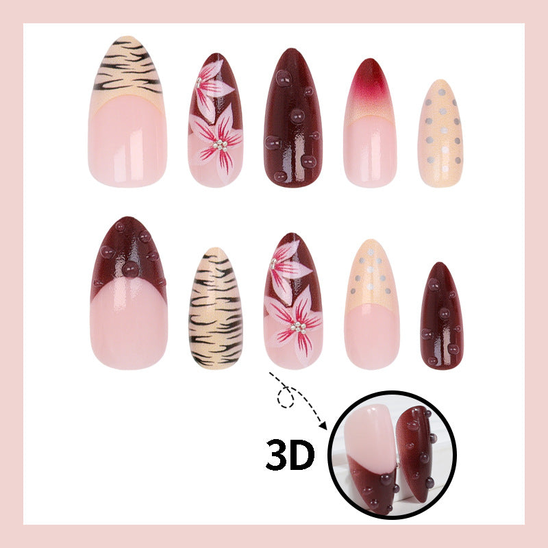 Kunstnagelset mit floralen und tierischen Designs Karnz
