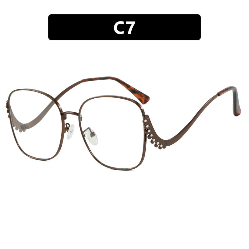 Damen auffällige Sonnenbrille mit funkelnden Applikationen Karnz