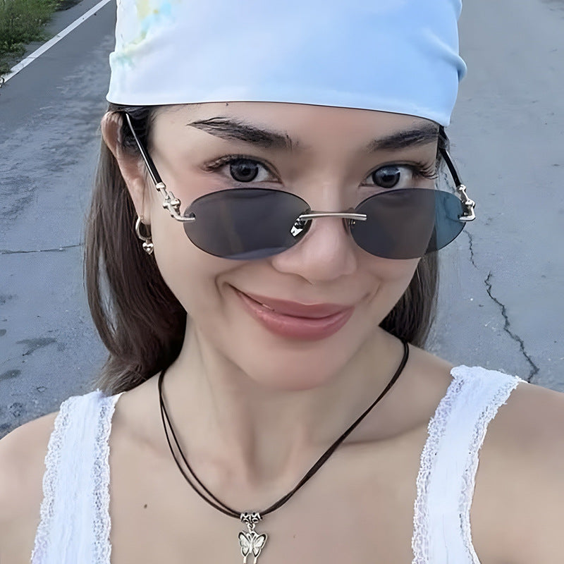 Damen ovale Sonnenbrille mit luxuriösem Metallrahmen und verspiegelten Gläsern Karnz