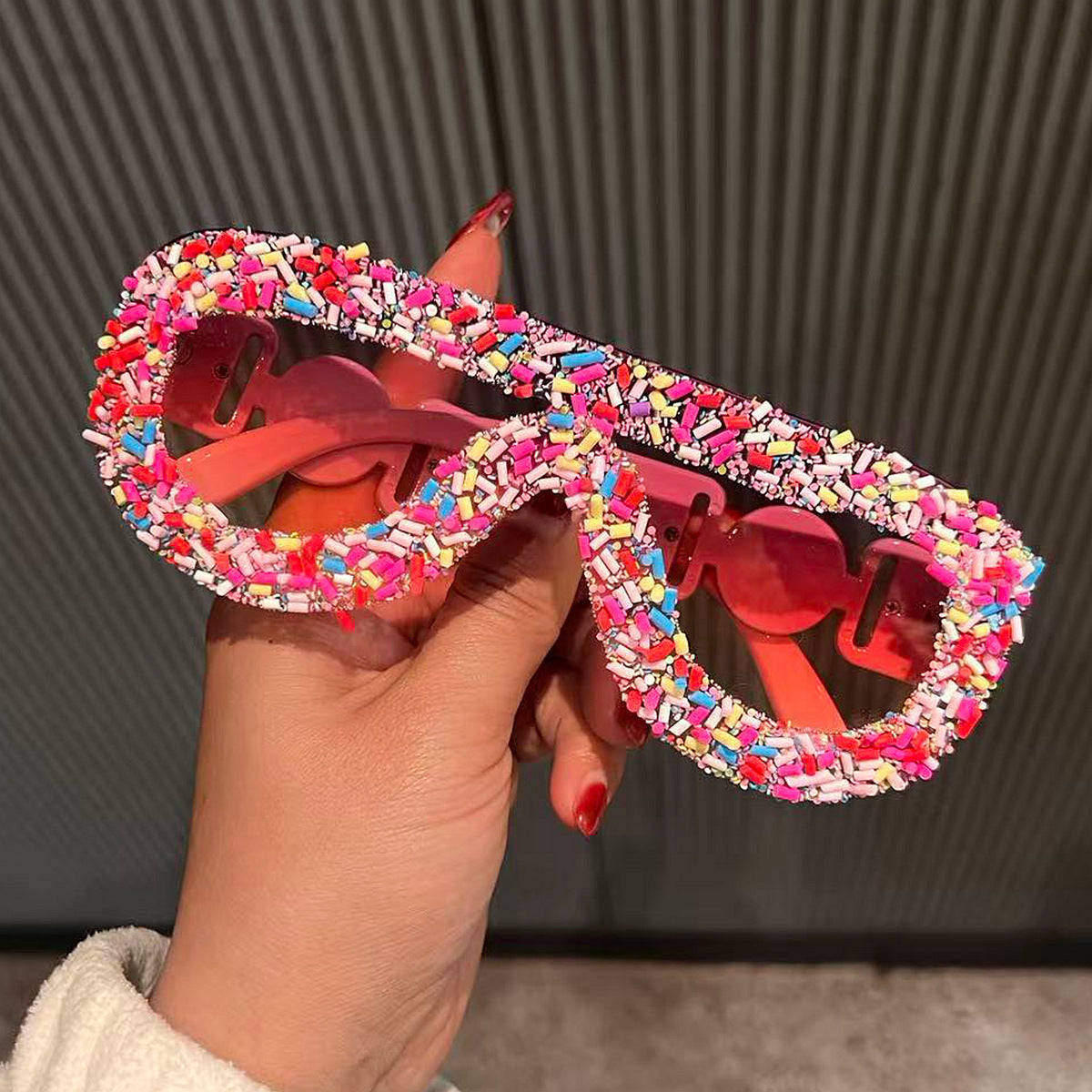Damen trendige Sonnenbrille mit kreativem Zuckerguss-Design Karnz