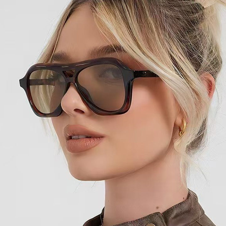Damen modische Sonnenbrille im innovativen Design mit breitem Rahmen Karnz