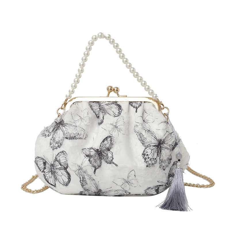 Elegante Clutch mit floralem Motiv