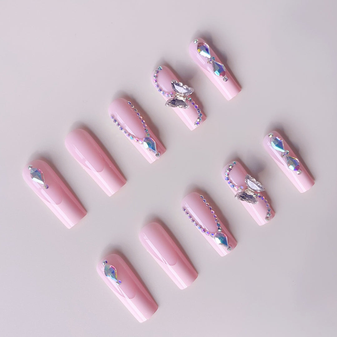 Kunstnagelset mit eleganten Glitzer- und Strassakzenten Karnz