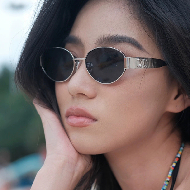 Damen modische Sonnenbrille im eleganten ovalen Design mit robustem Metallrahmen Karnz