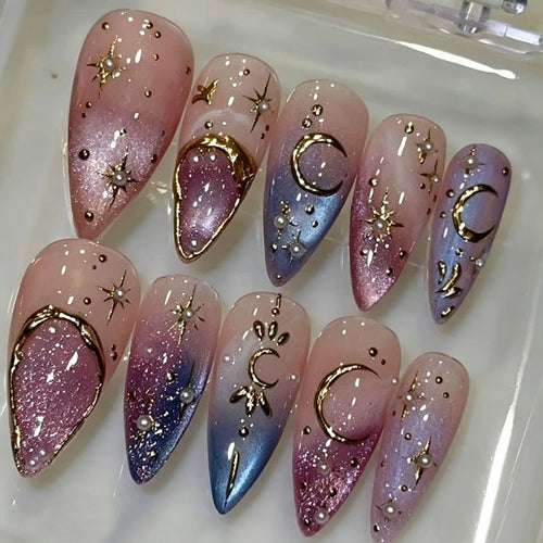 Kunstnagelset mit glamourösen Sternenmotiven Karnz