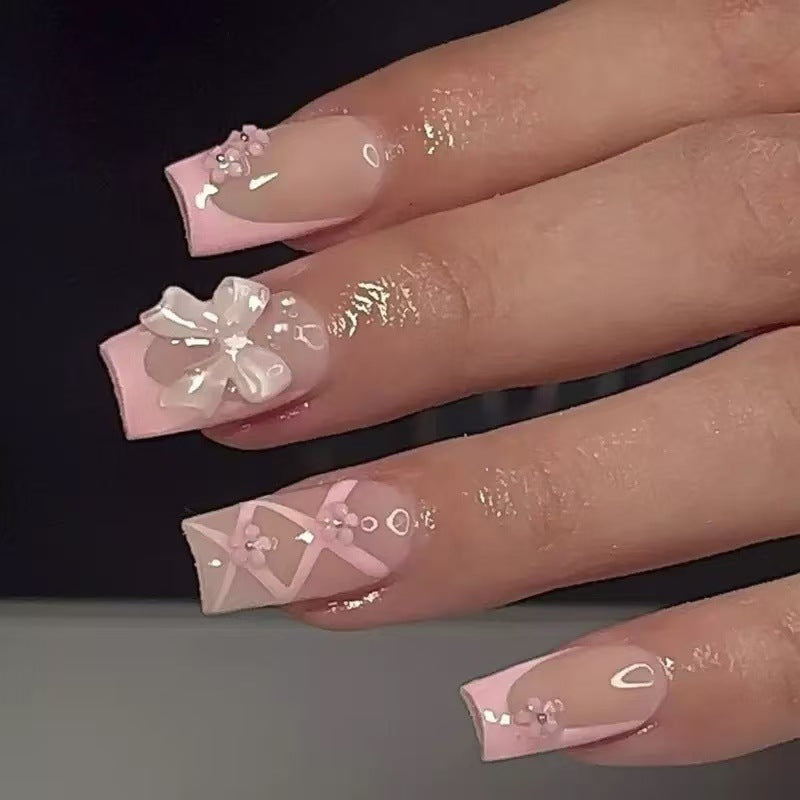 Kunstnagelset mit filigranen 3D-Blüten und Schleifen Karnz