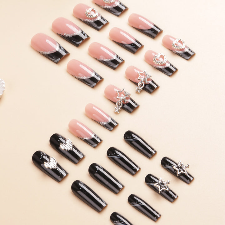 Künstlerisches langes Press-On-Nageldesign mit Strassakzenten Karnz