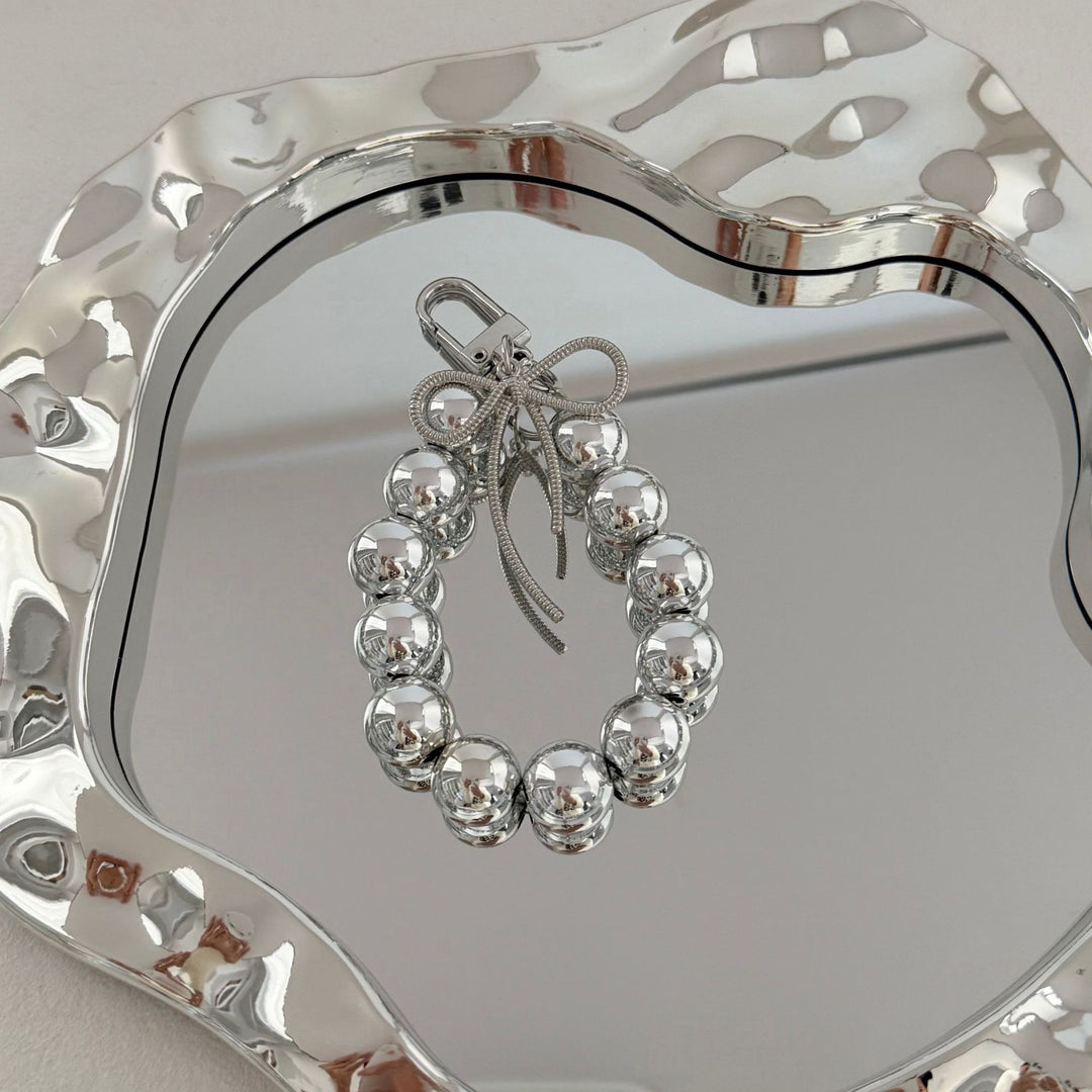 Eleganter Perlencharms-Schlüsselanhänger Karnz