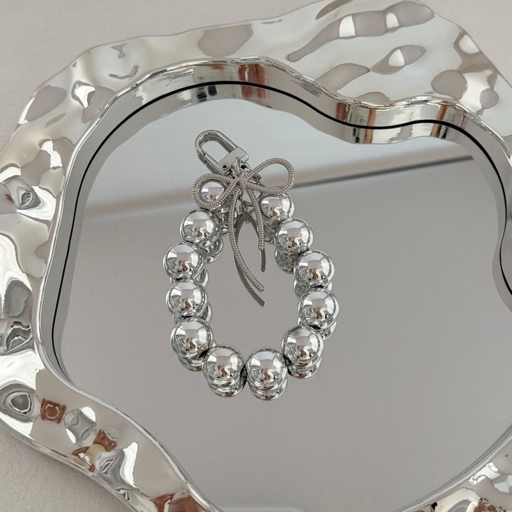 Eleganter Perlencharms-Schlüsselanhänger Karnz