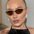 Damen Cat-Eye Sonnenbrille mit strassbesetztem Rahmen und schützenden Gläsern Karnz