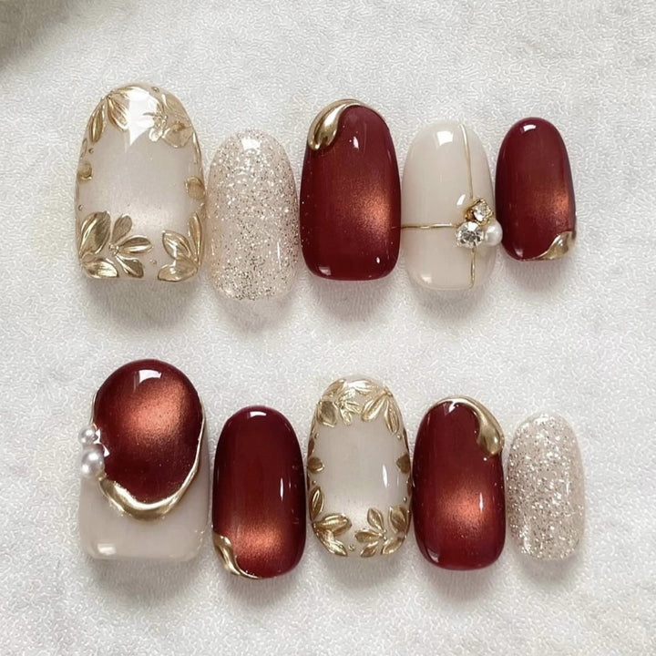 Kunstnagelset mit eleganten Blumen- und Glitzerakzenten Karnz