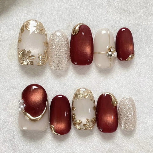 Kunstnagelset mit eleganten Blumen- und Glitzerakzenten Karnz