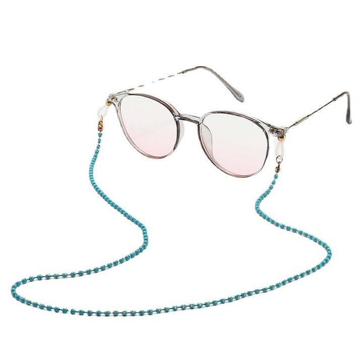 Modische Katzenaugenbrille mit Perlenkette Karnz