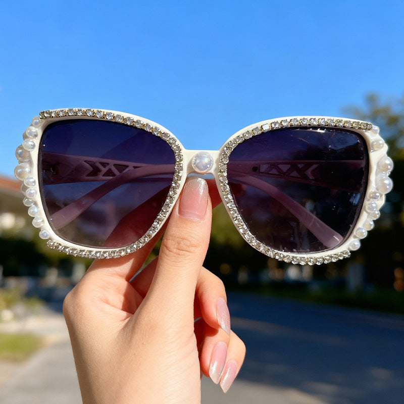Verschnörkelte Katzenaugen-Sonnenbrille Karnz
