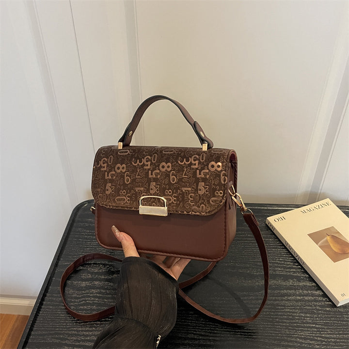 Stilvolle strukturierte Handtasche  1790614128