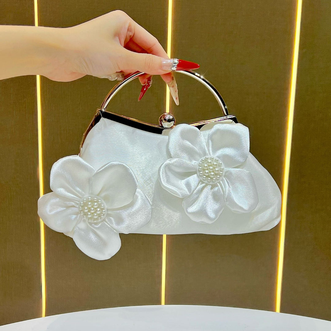 Florale Akzent Clutch