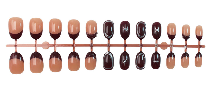 Kunstnagelset mit eleganten Farbverlauf und zarten Verzierungen Karnz