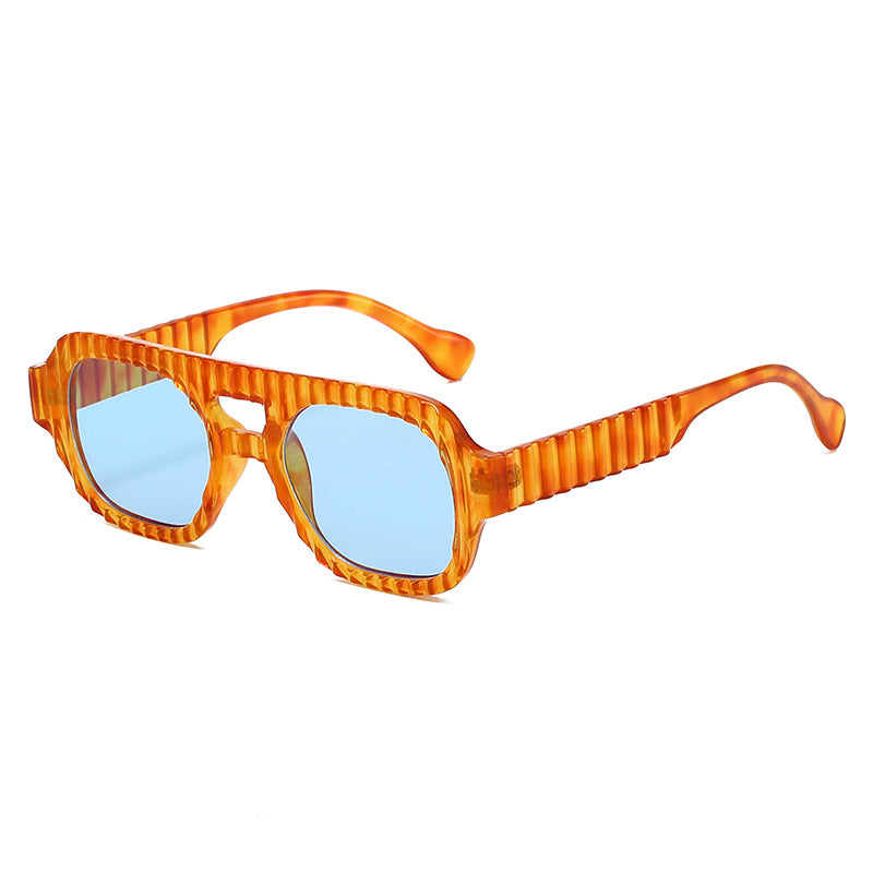 Damen modische Sonnenbrille im futuristischen Design mit strukturiertem Rahmen Karnz