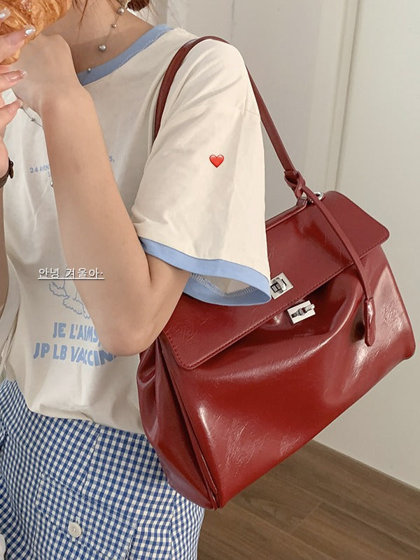 Strukturierte Lederhandtasche Karnz