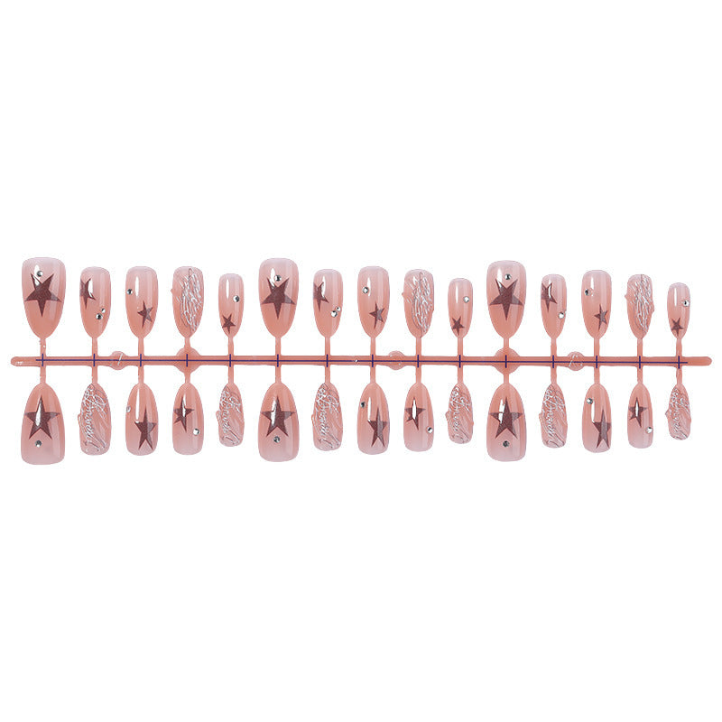 Kunstnagelset mit Sternen- und Glitzerakzenten Karnz