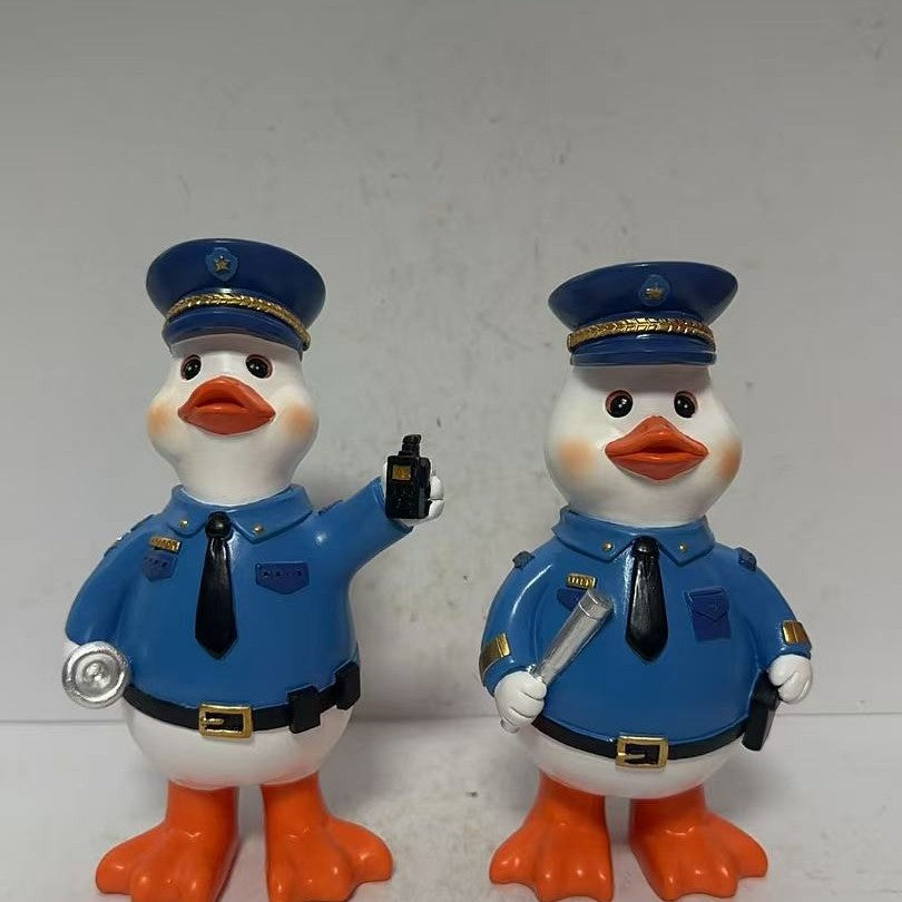 Lustige Polizeientenfigur Karnz