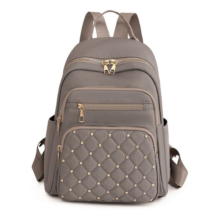 Quilted Rucksack mit dekorativen Nieten Karnz
