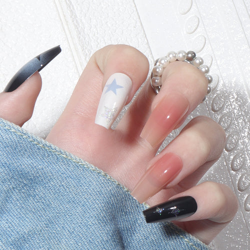 Künstlerischer Press-On Nagelset mit Stern- und Glitzerakzenten Karnz
