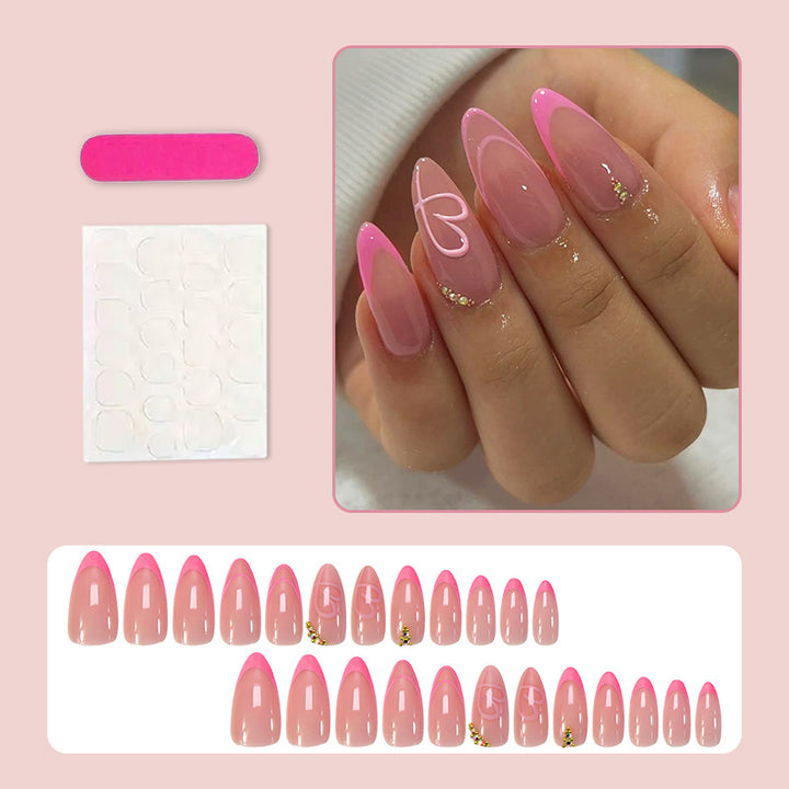 Kunstnagelset mit eleganter Herz- und Glitzerverzierung Karnz