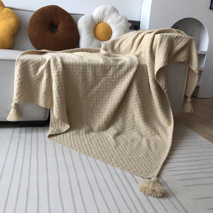 Strukturierte Strickwurfdecke