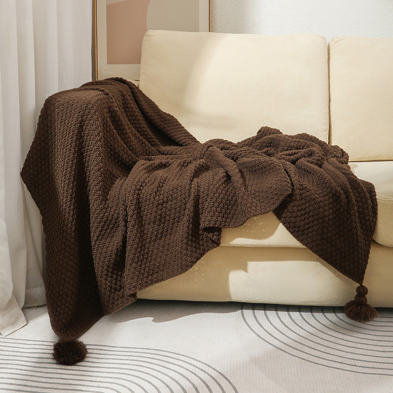 Strukturierte Strickwurfdecke