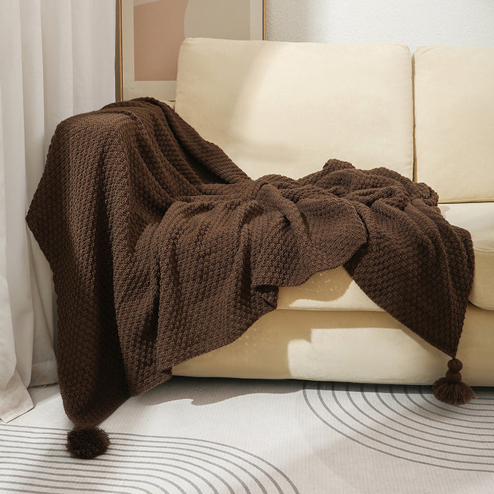 Strukturierte Strickwurfdecke