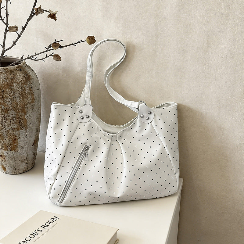 Stilvolle gepunktete Sling Bag