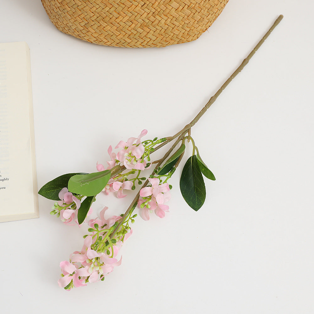 Künstlicher Blütenzweig mit leuchtenden Blüten Karnz