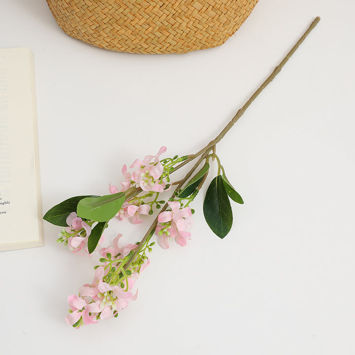 Künstlicher Blütenzweig mit leuchtenden Blüten Karnz