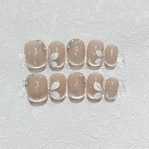 Dekoratives Press-On-Nagelset mit elegantem Blattdesign Karnz