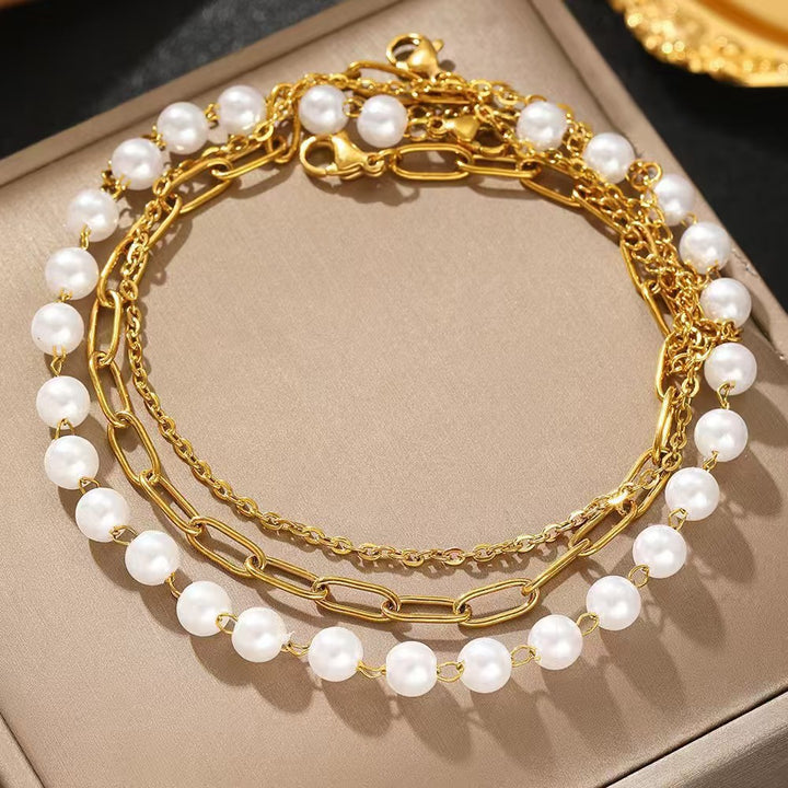 Elegantes Schichten Perlen- und Kettenarmband-Set Karnz