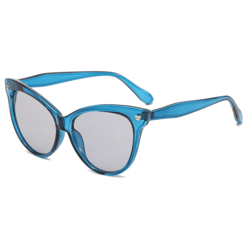 Damen modische Cat-Eye Sonnenbrille mit transparentem Rahmen und blauen Gläsern Karnz