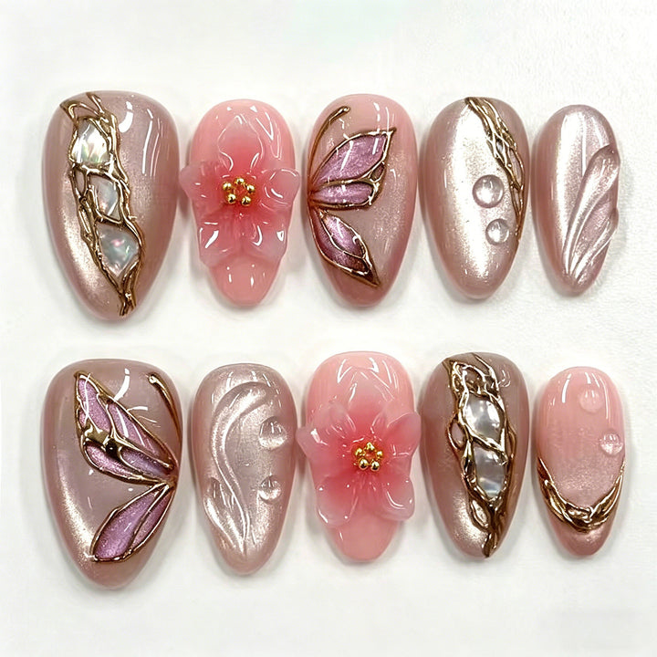 Künstlerisches Floral Press-On Nagelkunstset mit eleganten Edelsteindetails Karnz