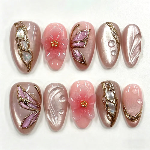 Künstlerisches Floral Press-On Nagelkunstset mit eleganten Edelsteindetails Karnz