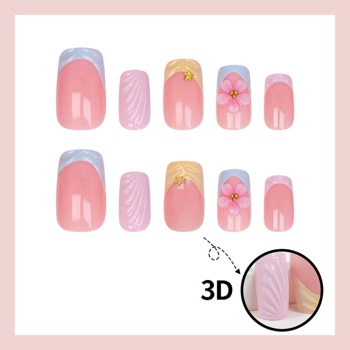 Kunstnagelset mit eleganten Blütenmotiven und farbenfrohen Designs Karnz