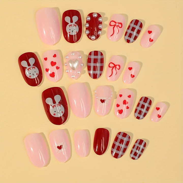 Kreatives Kunstnagelset mit niedlichen Hasen- und Herzen-Motiven Karnz