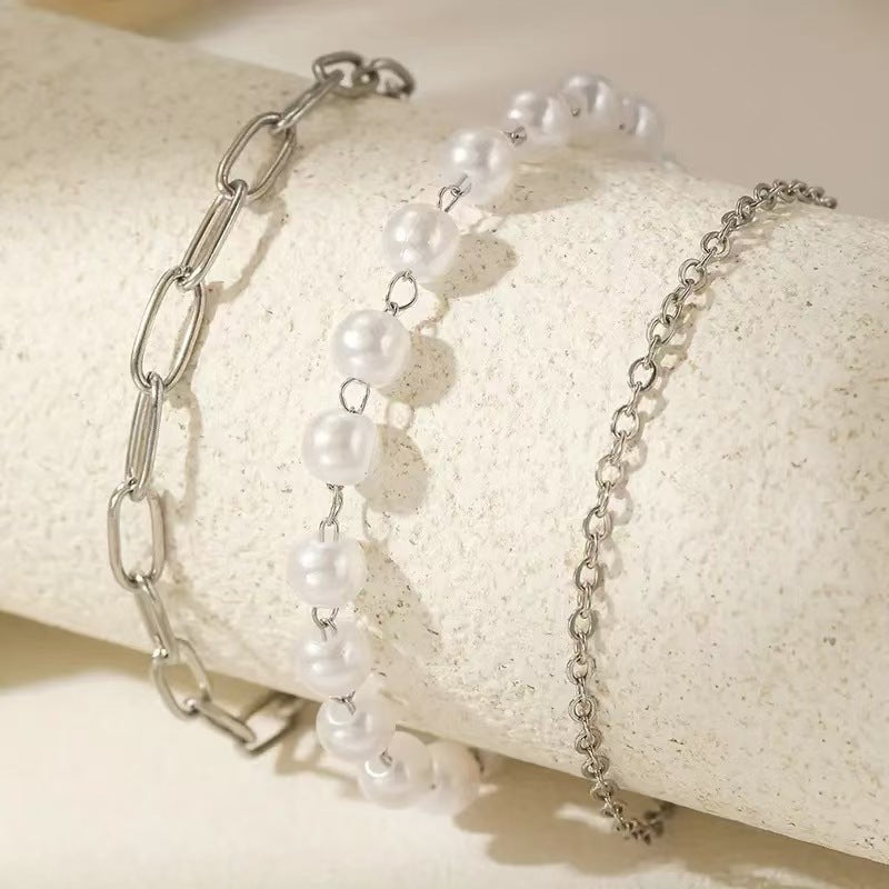 Elegantes Schichten Perlen- und Kettenarmband-Set Karnz