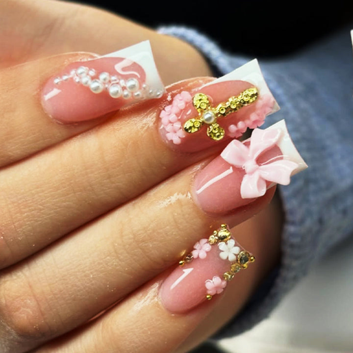 Dekorativer Press-On-Nagelset mit Schleife und floralen Akzenten Karnz