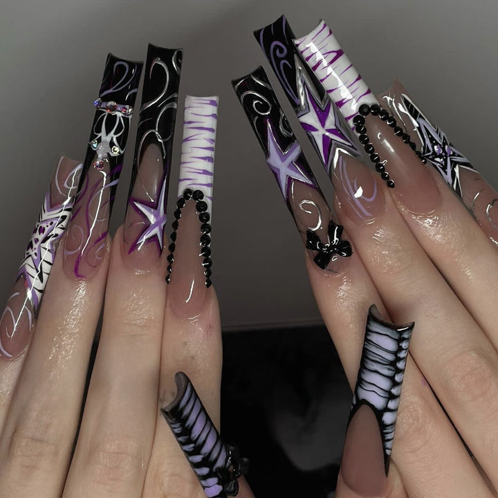 Künstlerisches thematisches Nagelspitzen-Set Karnz