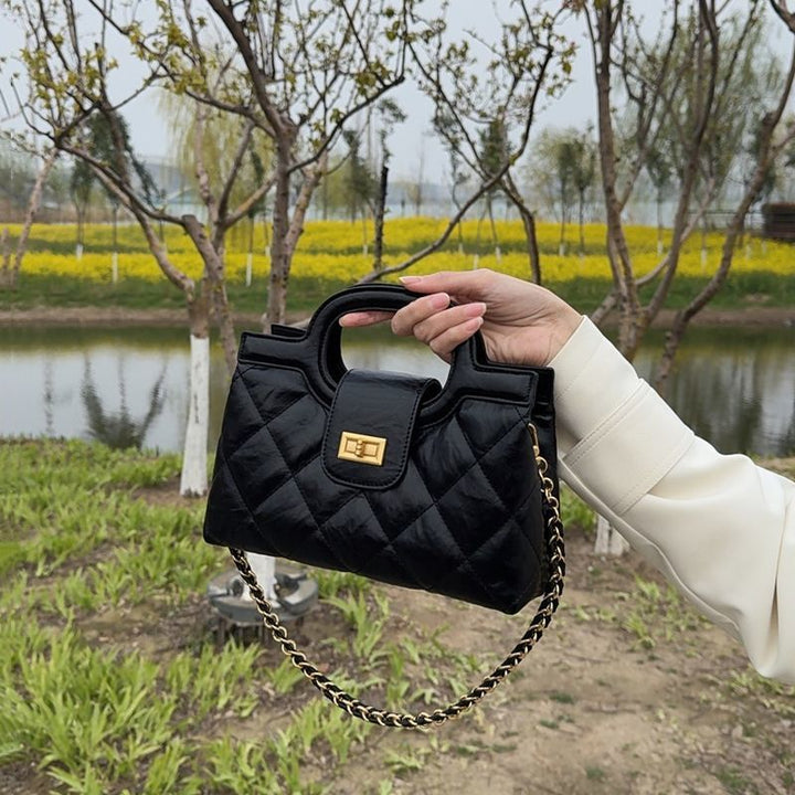 Gepolsterte elegante Handtasche Karnz