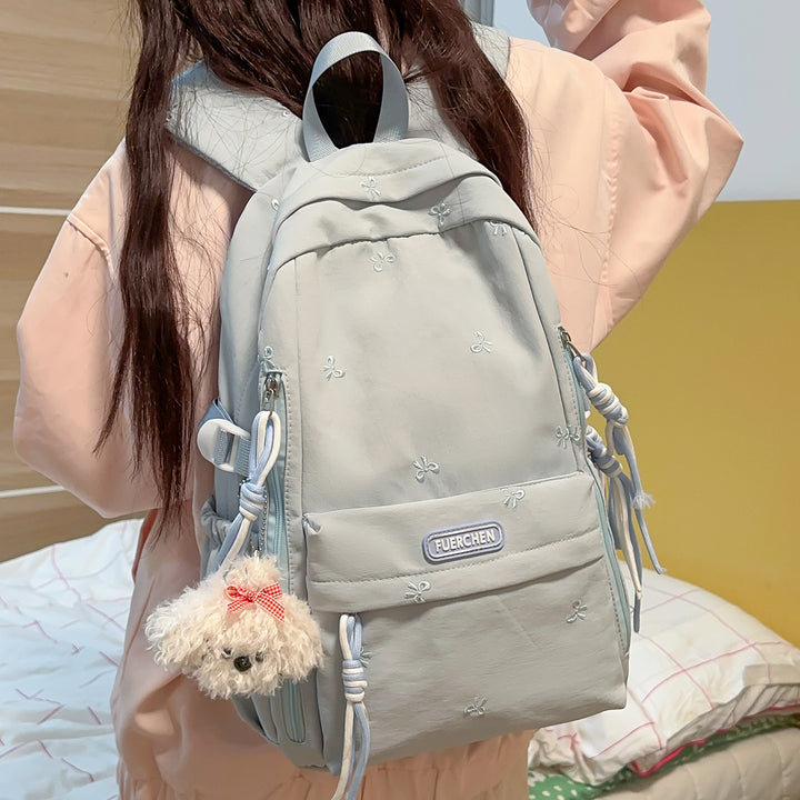 Stylischer Multi-Taschen Rucksack mit pelzigem Schlüsselanhänger Karnz