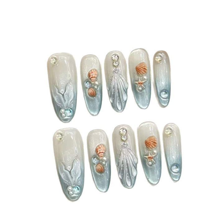 Dekorative Meer-inspirierte Press-On Nagelkunst