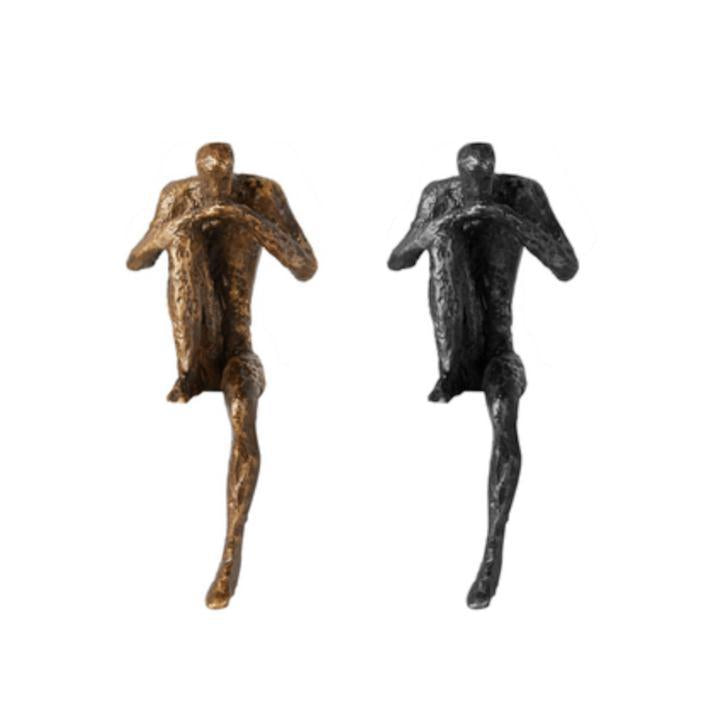 Künstlerische Sitzfigur Skulptur