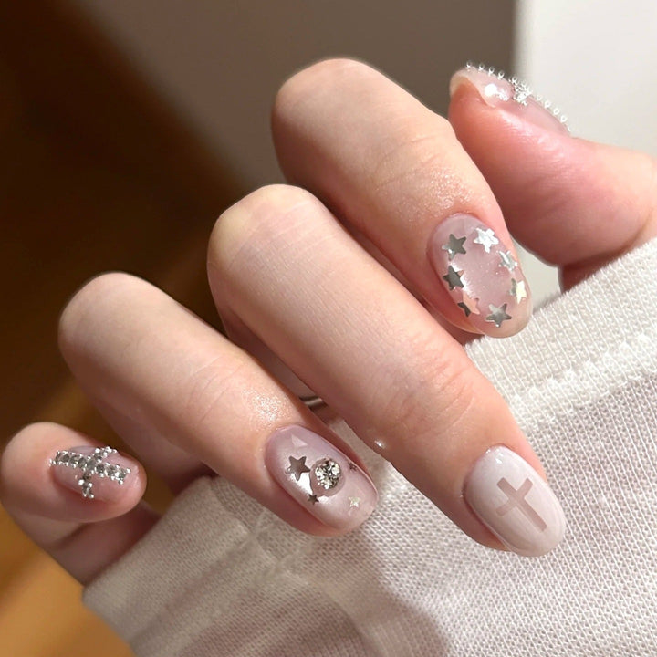 Dekoratives Press-On Nagelkunstset mit Stern- und Kreuzdesigns Karnz